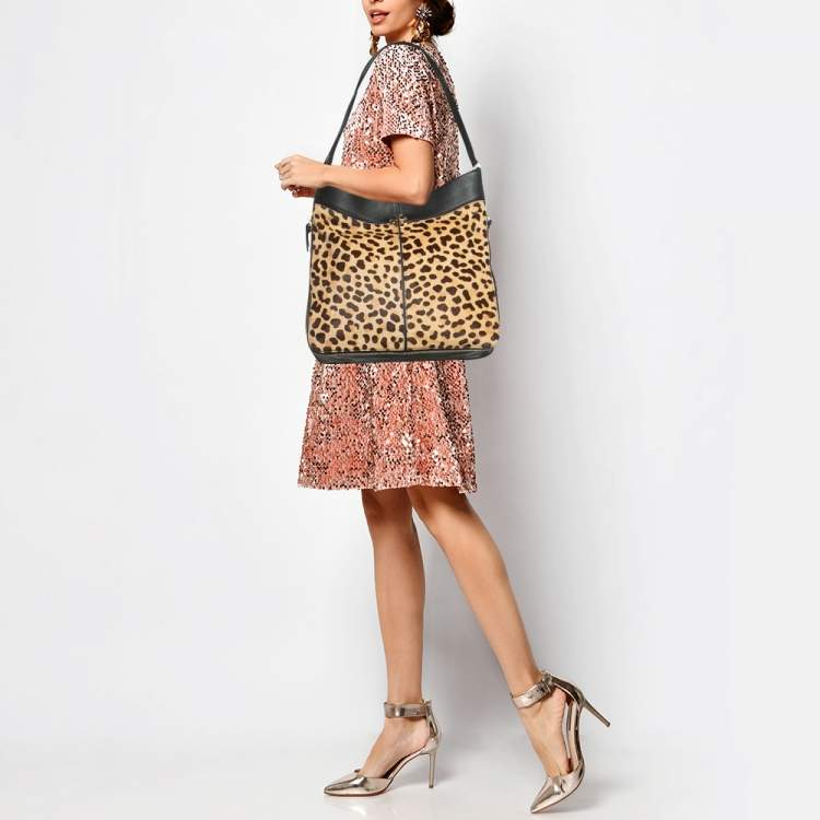 Pre Owned Tory Burch Brown/Black Leopard Print Calfhair and Leather Zip Around Shoulder Bag