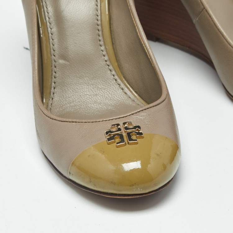 Pre Owned Tory Burch Grey/Beige Leather Reva Logo Cap Toe Wedge Pumps Size 35.5