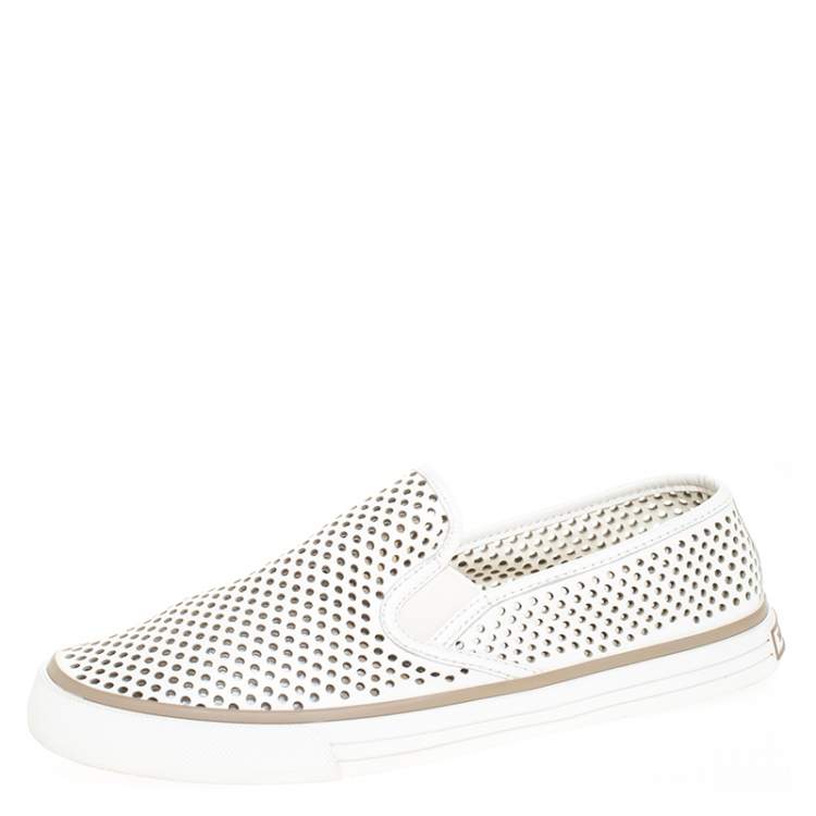 white perforated slip on sneakers