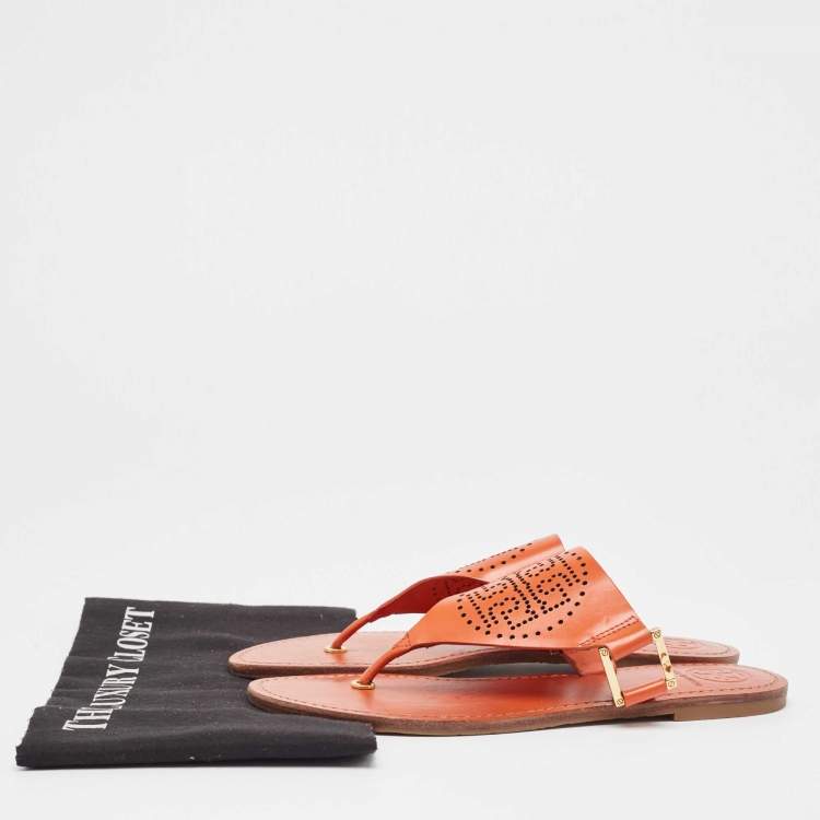مملوكة مسبقًا Tory Burch Orange Perforated Leather Thong  Sandals Size 38.5