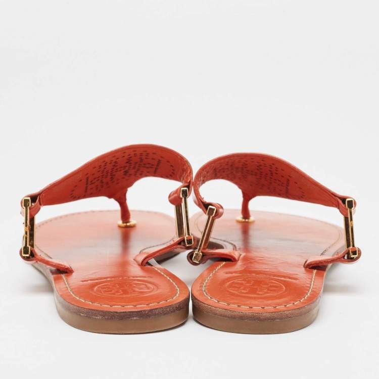 مملوكة مسبقًا Tory Burch Orange Perforated Leather Thong  Sandals Size 38.5