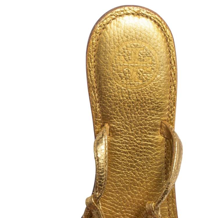 Pre Owned Tory Burch Metallic Gold Leather T Strap Flat Sandals Size 38.5