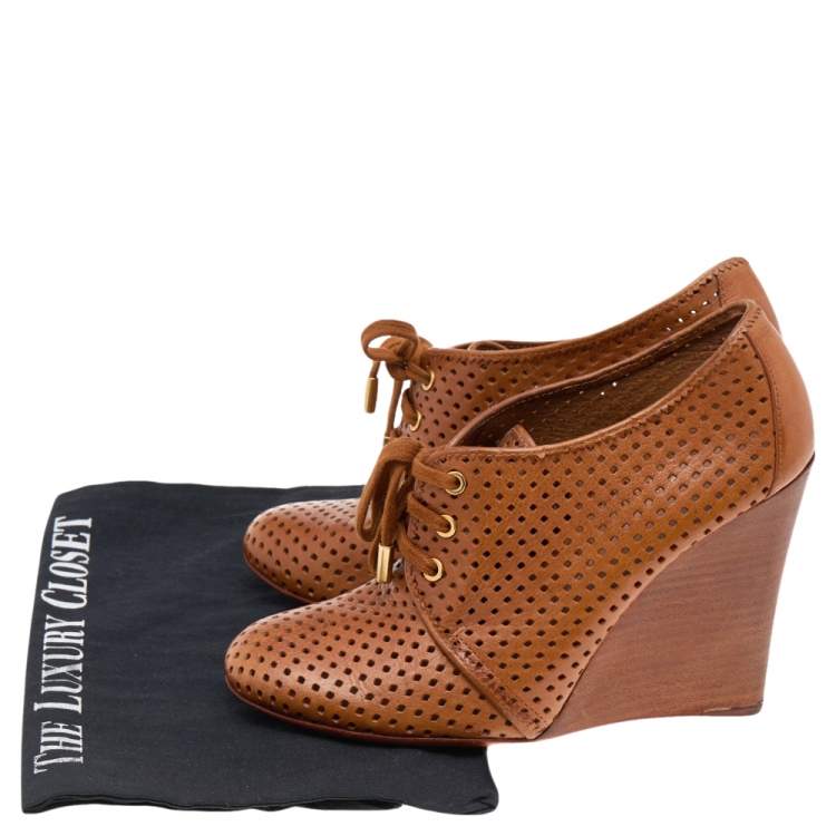 Pre Owned Tory Burch Brown Perforated Leather Wedge Sneakers Size 38.5