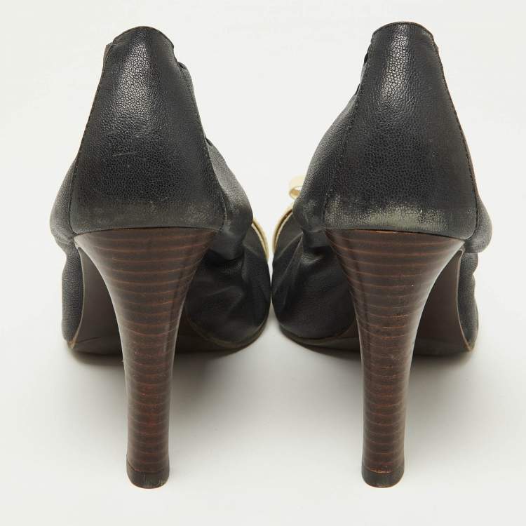 Pre Owned Tory Burch Blue/Beige Leather and Patent Romy Cap Toe Pumps Size 41
