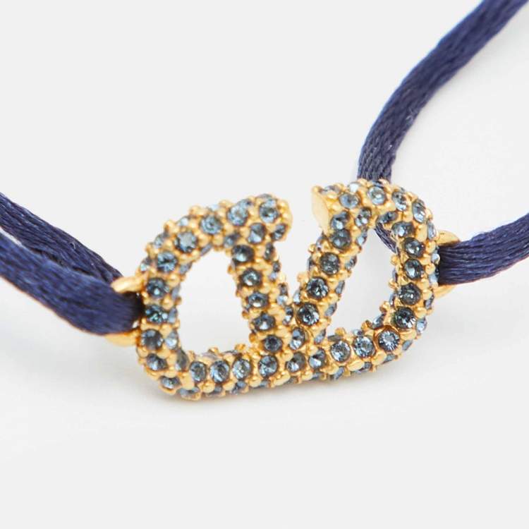 Pre Owned Valentino VLogo Signature Blue Crystal-Embellished Gold Tone Cord Bracelet