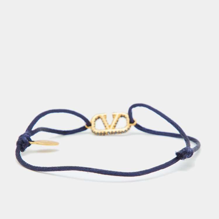 Pre Owned Valentino VLogo Signature Blue Crystal-Embellished Gold Tone Cord Bracelet