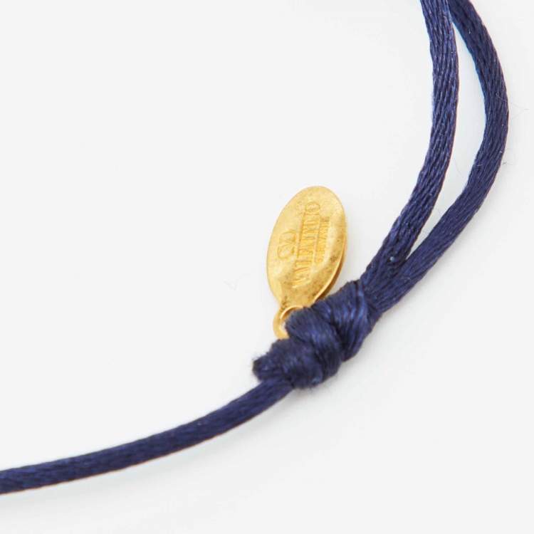 Pre Owned Valentino VLogo Signature Blue Crystal-Embellished Gold Tone Cord Bracelet