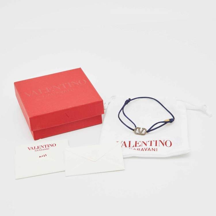 Pre Owned Valentino VLogo Signature Blue Crystal-Embellished Gold Tone Cord Bracelet