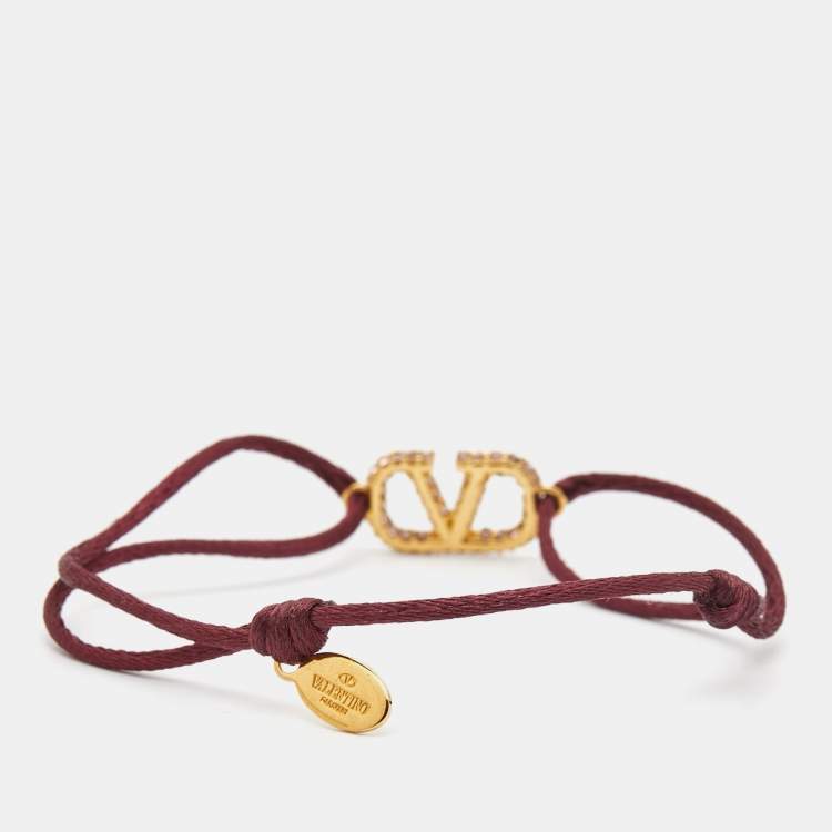 Pre Owned Valentino VLogo Crystals Gold Tone Cord Bracelet