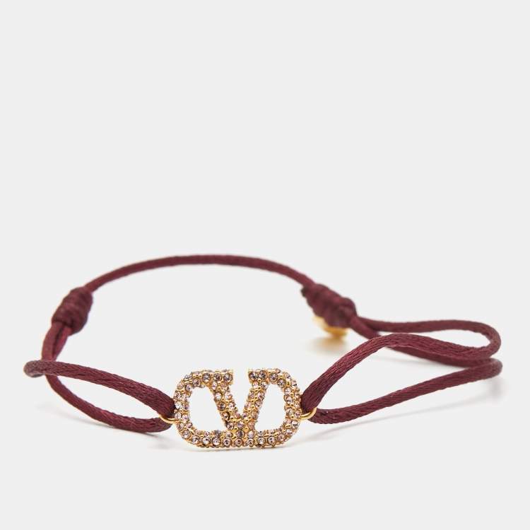 Pre Owned Valentino VLogo Crystals Gold Tone Cord Bracelet