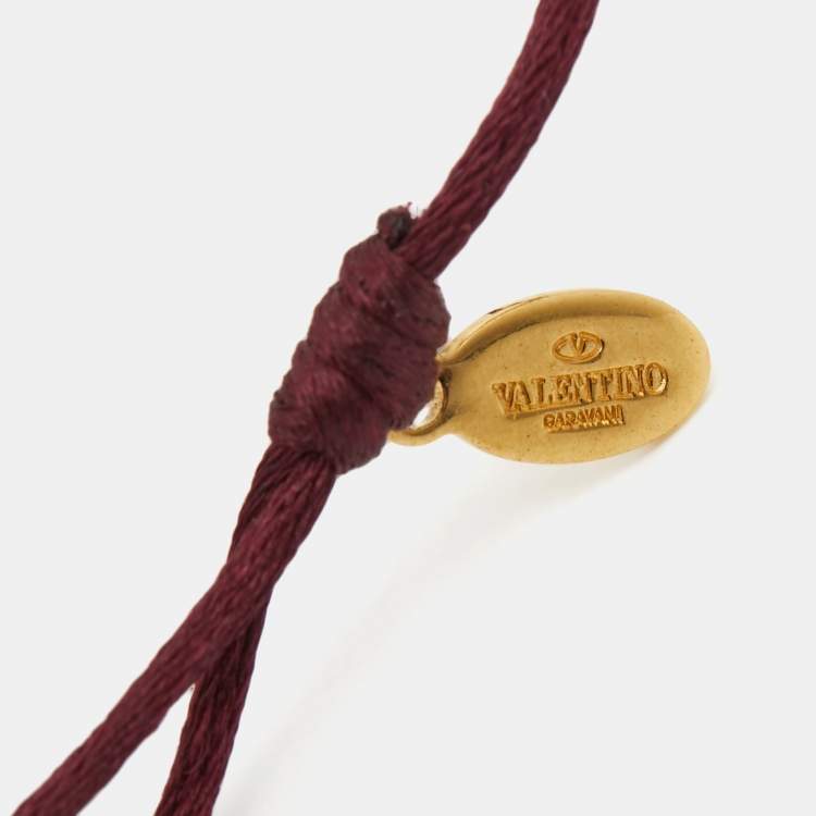 Pre Owned Valentino VLogo Crystals Gold Tone Cord Bracelet