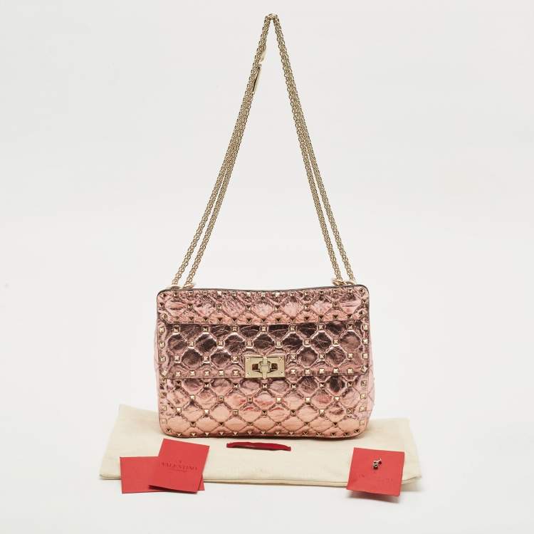 Pre Owned Valentino Metallic Pink Quilted Leather Medium Rockstud Spike Top Handle Bag