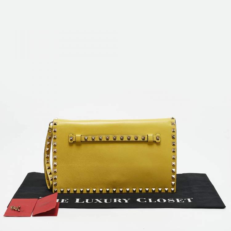 Pre Owned Valentino Yellow Leather Rockstud Flap Wristlet Clutch