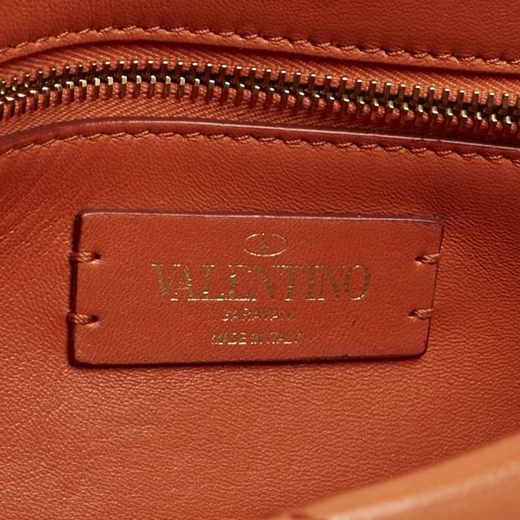 Pre Owned Valentino Orange Quilted Leather Medium Roman Stud Top Handle Bag