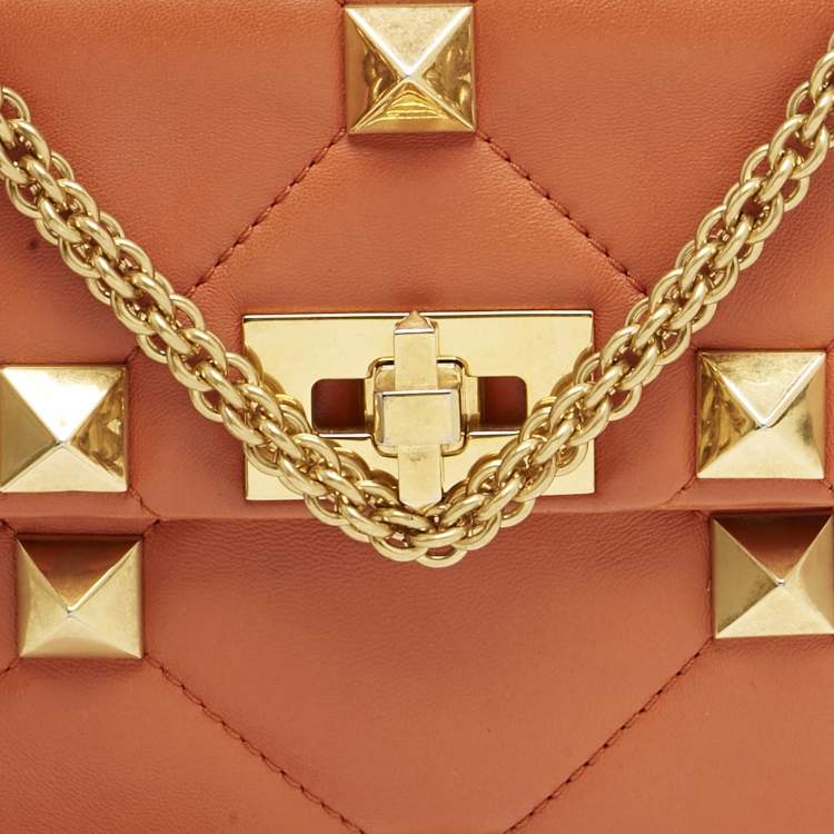 Pre Owned Valentino Orange Quilted Leather Medium Roman Stud Top Handle Bag