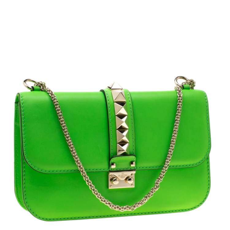 neon green luggage