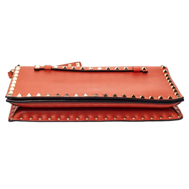 Pre Owned Valentino Orange Leather Rockstud Wristlet Clutch