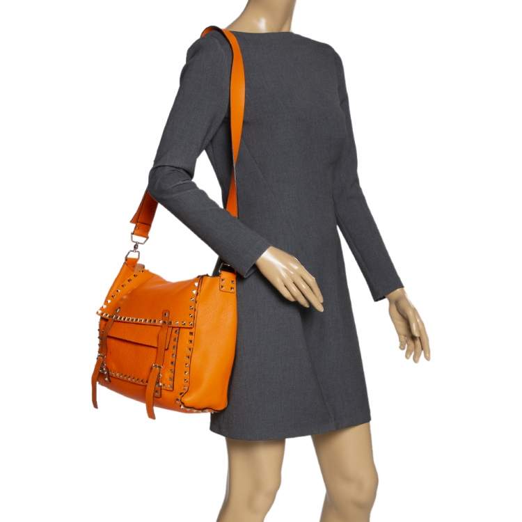 Pre Owned Valentino Neon Orange Leather Rockstud Messenger Bag
