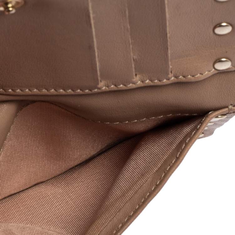 مملوكة مسبقًا Valentino Metallic Gold Leather Rockstud Zip Wallet