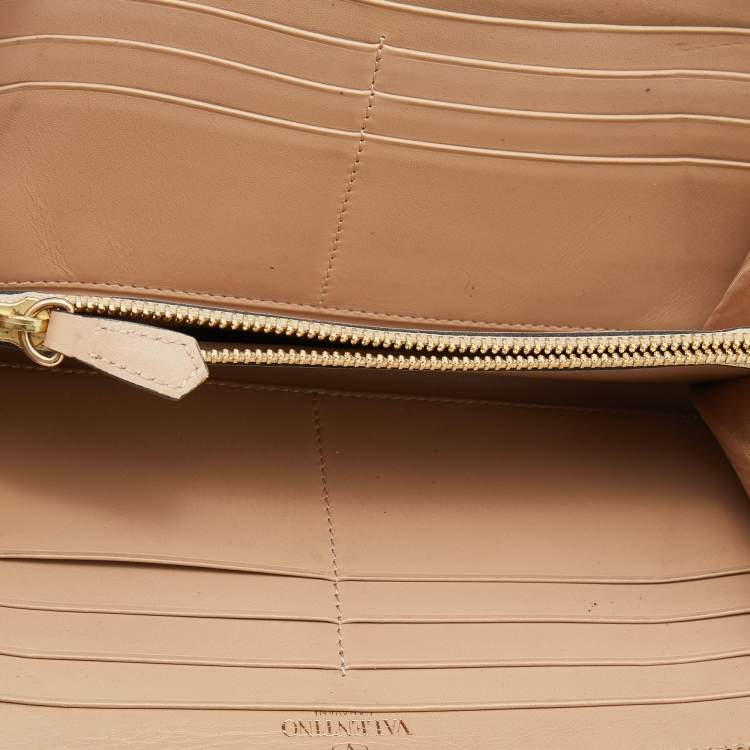 Pre Owned Valentino Beige Leather Rockstud Zip Around Continental Wallet