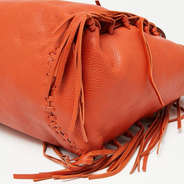 Pre Owned Valentino Orange Pebbled Leather Fringe C-Rockee Tote