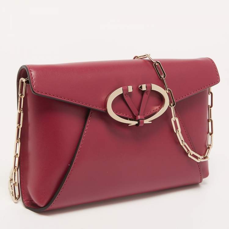 Pre Owned Valentino Dark Pink Leather V Rivet Clutch Bag