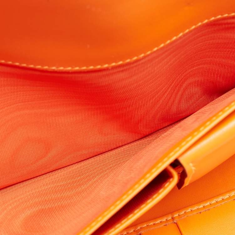 Pre Owned Valentino Neon Orange Leather Rockstud Trifold Wristlet Clutch