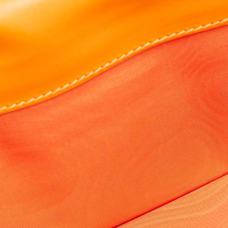 Pre Owned Valentino Neon Orange Leather Rockstud Trifold Wristlet Clutch