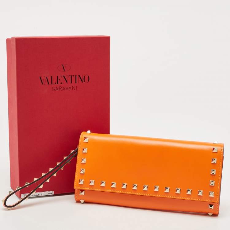 Pre Owned Valentino Neon Orange Leather Rockstud Trifold Wristlet Clutch