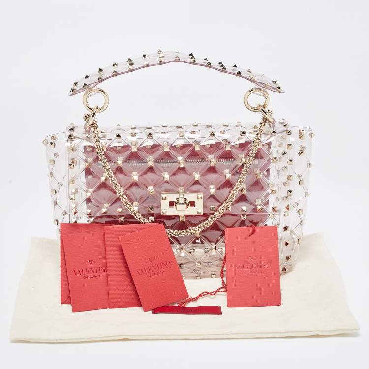 Pre Owned Valentino Clear/Red PVC Medium Rockstud Spike Top Handle Bag