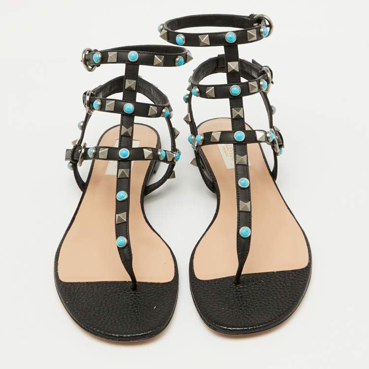 Pre Owned Valentino Black Leather Rolling Rockstud Ankle Strap Flat Sandals Size 38.5