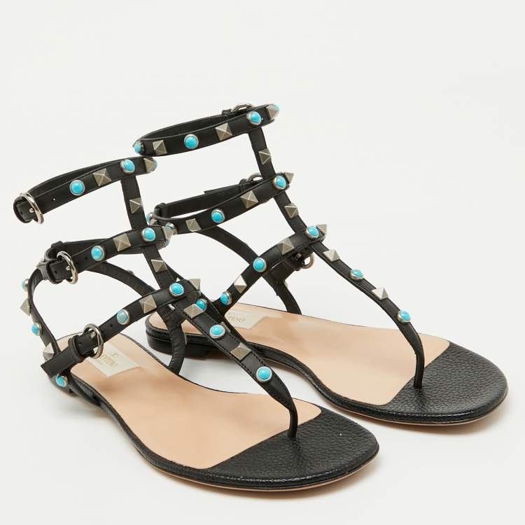Pre Owned Valentino Black Leather Rolling Rockstud Ankle Strap Flat Sandals Size 38.5
