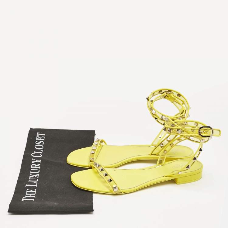 Pre Owned Valentino Yellow PVC and Leather Rockstud Ankle Strap Flat Sandals Size 39