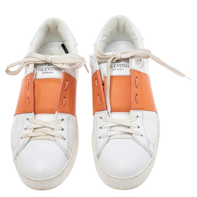 Pre Owned Valentino White/Orange Leather Rockstud Low-Top Sneakers Size 36
