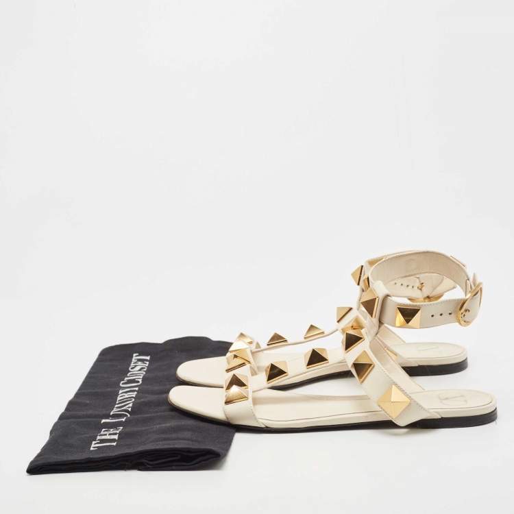 Pre Owned Valentino Cream Leather Roman Stud Ankle Strap Flats Sandals Size 38.5