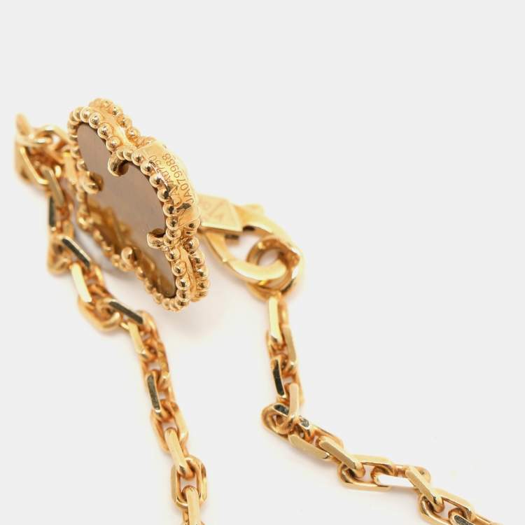 مملوكة مسبقًا Van Cleef & Arpels Magic Alhambra 6 Motif Carnelian Tiger's Eye 18K Yellow Gold Pendant Necklace