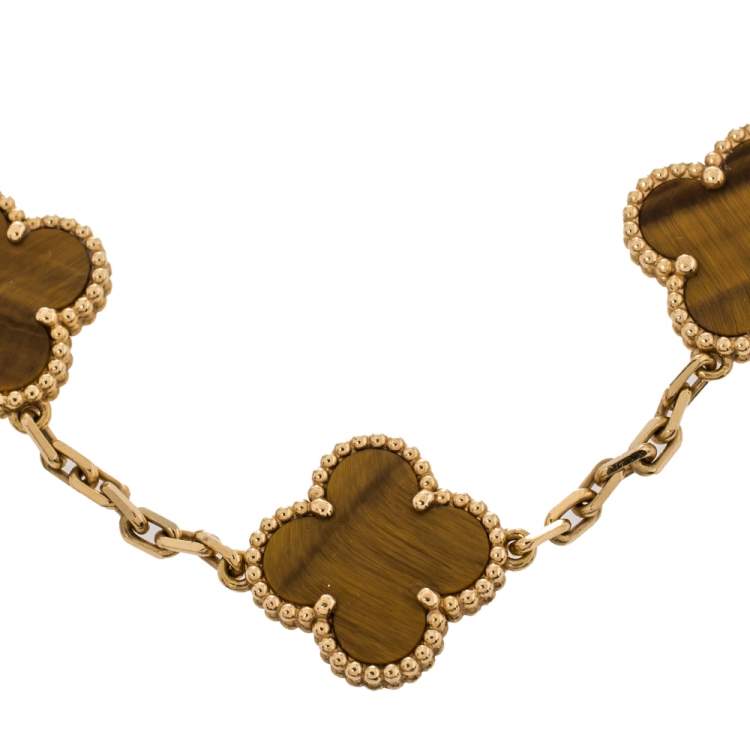 Van Cleef and Arpels Tiger's Eye Vintage Alhambra 5 Motif Gold Bracelet at  1stDibs