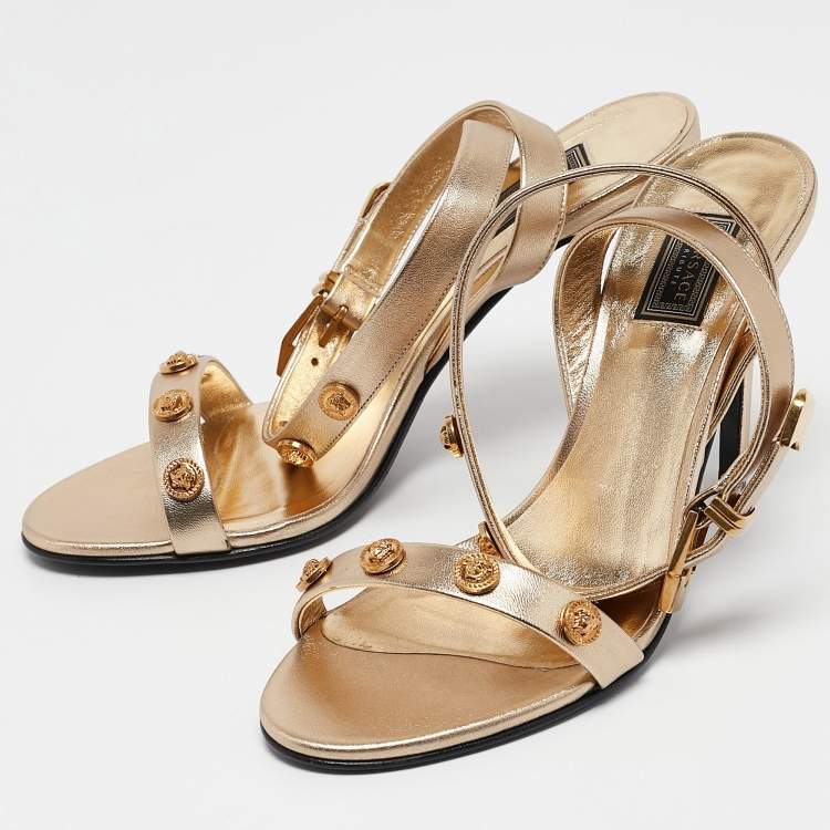 Pre Owned Versace Gold Leather Medusa Studded Ankle Strap Sandals Size 38