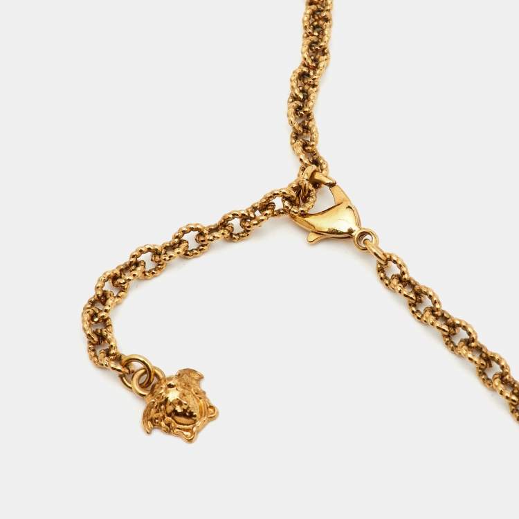Pre Owned Versace Medusa Crystal Gold Tone Long Pendant Necklace