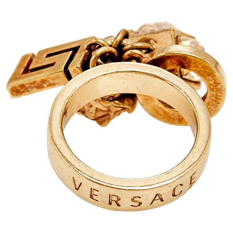 Pre Owned Versace Gold Tone Star & Medusa Charms Ring Size EU 57