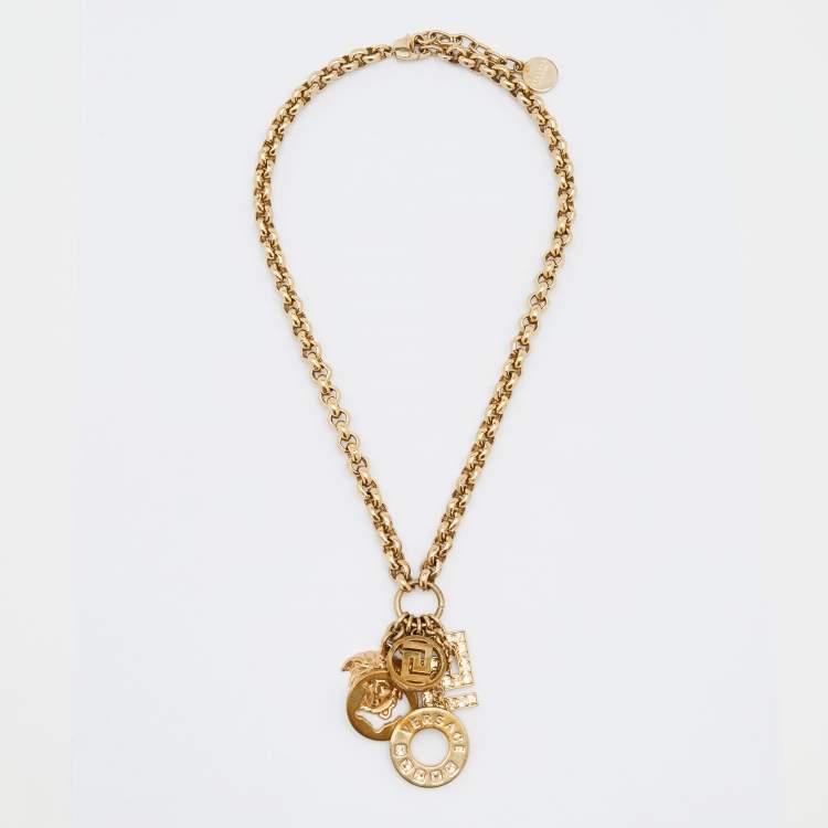 مملوكة مسبقًا Versace Medusa Gold Tone Multi Charm Pendant Necklace