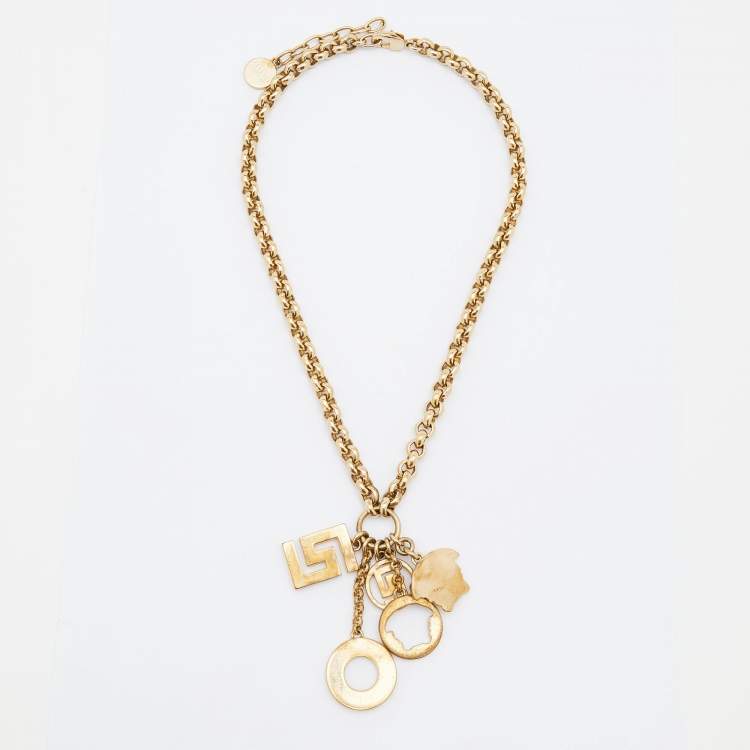 مملوكة مسبقًا Versace Medusa Gold Tone Multi Charm Pendant Necklace