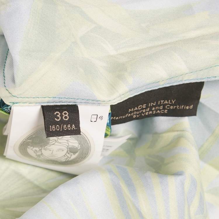 Pre Owned تنورة ميدي بليسيه بنقشة الأدغال الخضراء من فيرساتشي مقاس صغير