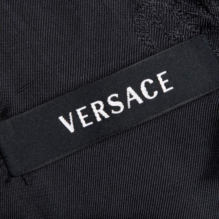 مملوكة مسبقًا Versace Black Fabric Blend Cutout Stretch Knit Peplum Top S