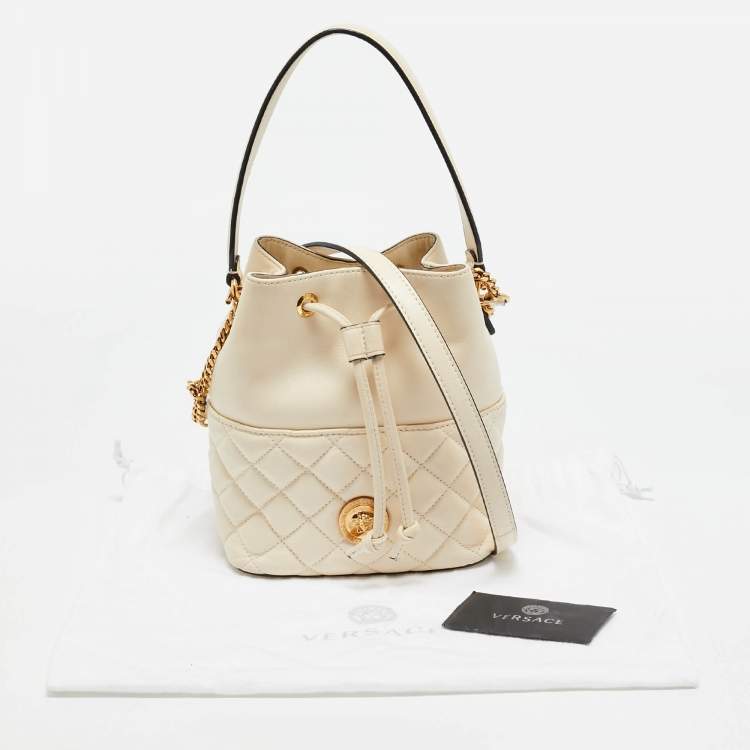 Pre Owned Versace Cream Quilted Leather Medusa Drawstring Bucket Bag