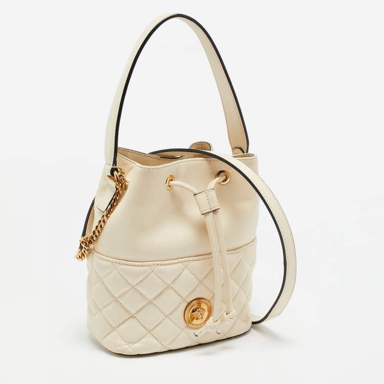 Pre Owned Versace Cream Quilted Leather Medusa Drawstring Bucket Bag