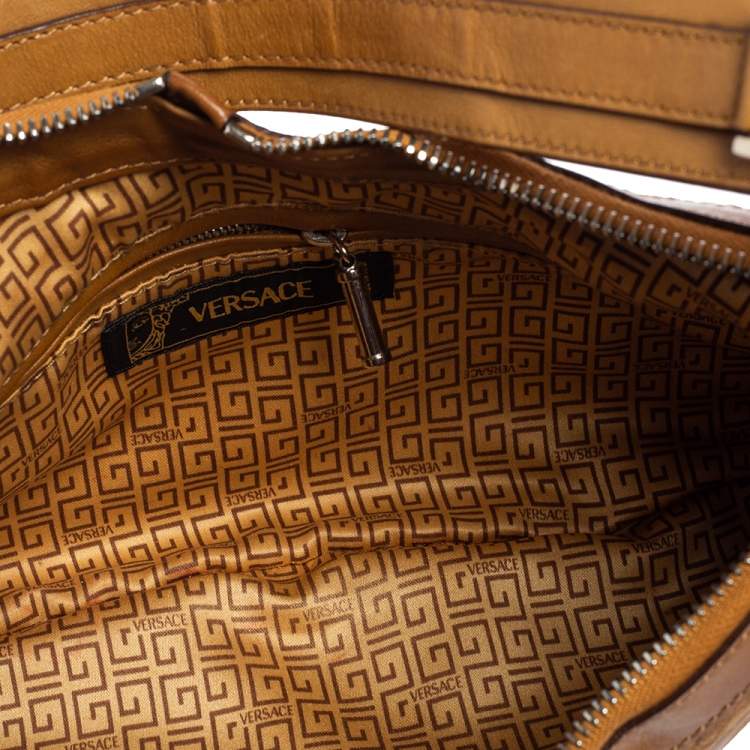 Pre Owned Versace Tan Logo Embossed Suede and Leather Charm Baguette Bag