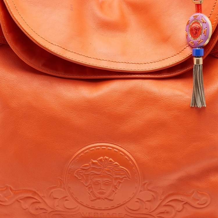 Pre Owned Versace Orange Leather Medusa Logo Braided Handle Hobo