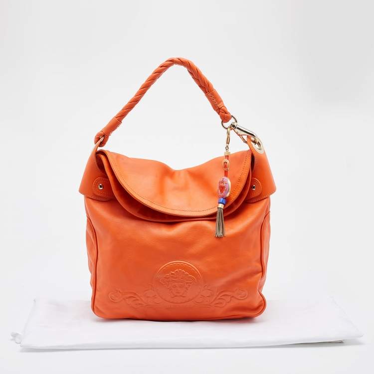 Pre Owned Versace Orange Leather Medusa Logo Braided Handle Hobo