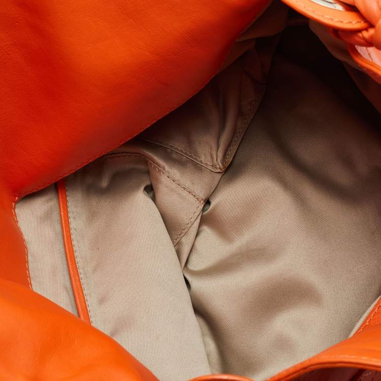 Pre Owned Versace Orange Leather Medusa Logo Braided Handle Hobo